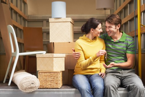 Furniture and household items prepared for storage during a move in Mottingham