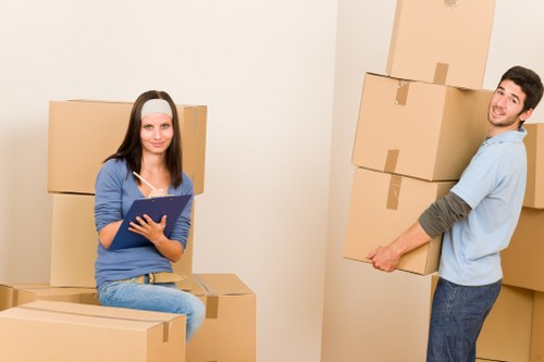 Fragile items and packing materials prepared for a Mottingham house move